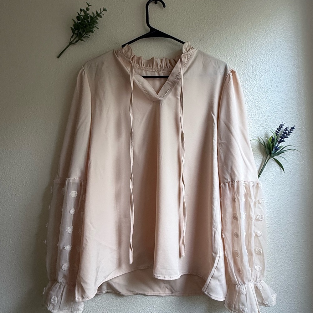 Elegant Cream Blouse with Sheer Sleeves